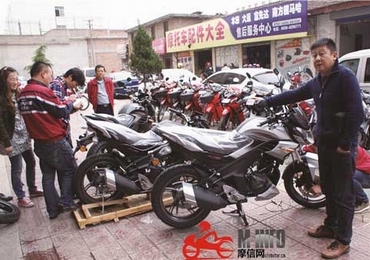 访重庆建设摩托车股份有限公司总经理嘉奖获得者唐荣彪